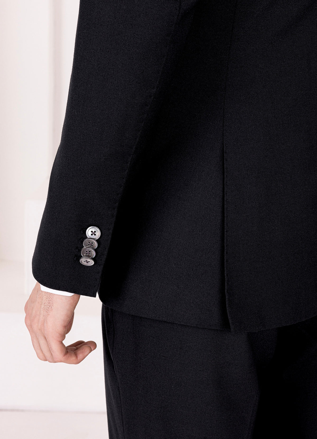 Jade Black Worsted Wool 4 Way Stretch Wrinkle Free Fluid Drape Fabric Double Breasted Suit